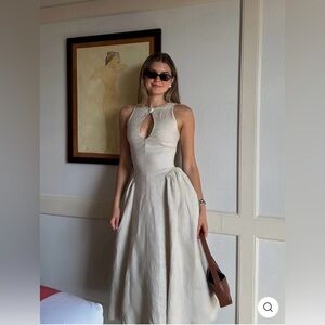 Adorable dress, linen like, midi length, zipper closure in back, button front